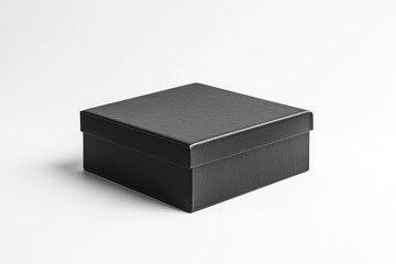 Naklejka premium Black square shoe box mockup, against a white background. High-resolution, professional photograph with studio lighting.