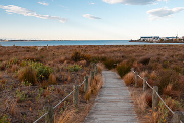 Sunset in the coastal town of Timaru with spectacular colours at the beach side and stunning ocean views (Timaru, South Island, New Zealand)