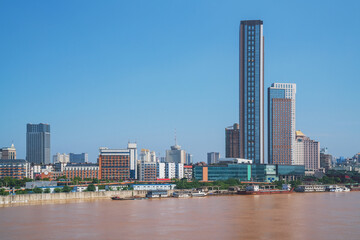 Fototapeta premium The urban skyline and Ganjiang River scenery of Nanchang City, Jiangxi Province, China on April 1, 2024