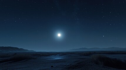 Obraz premium A serene night landscape illuminated by a bright full moon over distant hills.