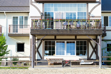 Fototapeta premium white building ranch south Western architecture style motel place apartments facade exterior entrance symmetry balcony walls and windows