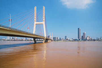 The urban skyline, Bayi Bridge, and Ganjiang River scenery of Nanchang City, Jiangxi Province, China on April 1, 2024