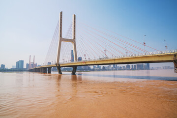 The urban skyline, Bayi Bridge, and Ganjiang River scenery of Nanchang City, Jiangxi Province, China on April 1, 2024