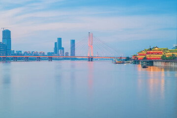 The urban skyline, Bayi Bridge, and Ganjiang River scenery of Nanchang City, Jiangxi Province, China on April 1, 2024