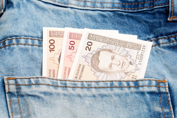 Bosnia and Herzegovina convertible mark in the pocket of blue jeans