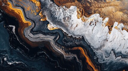 Abstract aerial view of colorful natural patterns formed by land and water.