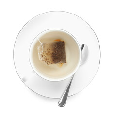 Tea bag in cup with hot drink isolated on white, top view