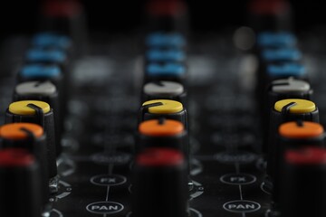 Professional mixing console, closeup. Radio studio equipment