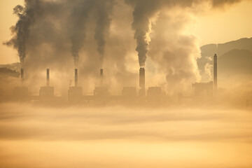 Smog-Filled Skyline,  A haunting view of industrial chimneys spewing black smoke, shrouded in a...