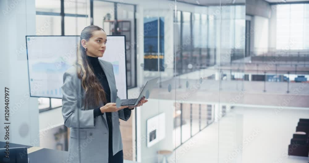 Aufkleber confident caucasian woman working on laptop computer in a bright and modern office. young manager in