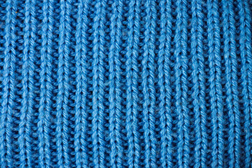 Seamless knitted fabric. Knitted sweater, plaid, scarf. Knitted background