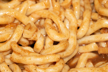 Close up of Egg Noodles in a Thick Sauce Meal