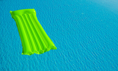 Air Mattress On The Water In The Pool