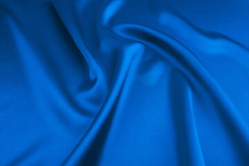 Blue satin or silk fabric as background
