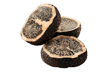 Fresh black Perigord truffles isolated on white transparent background, great for culinary and gourmet themes.