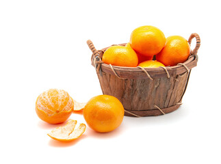Mandarin in basket isolated on white