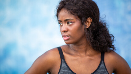 close-up portrait young woman with a contemplative gaze