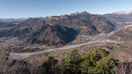 Panorama of the Carnic mountains from the top of Mount Giaideit, Friulian Alps. Sunny day and view from above of the villages of Carnia.