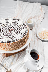 Esterhazy cake in a cut, traditional Hungarian, German cake with almonds and condensed milk, nut cake, whipped cream, coffee on a light background, flatlay, still life, food photo dessert