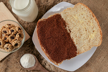 Bread with choco and butter on a plate for breakfast	
