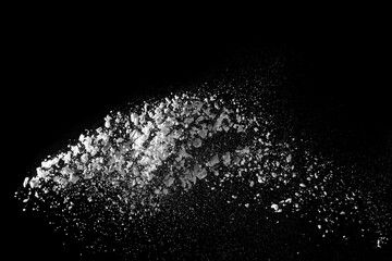 White snow falling down on black background