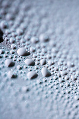Close Up of Water Droplets Liquid Bubbles Abstract Background in Gentle Blue
