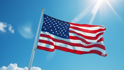 Obraz premium The American flag flutters on a pole, showing pride in the flag and the symbols of the country.