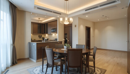modern apartment with a dining room furnished with a table and chairs, as well as an empty living room with a beige wall