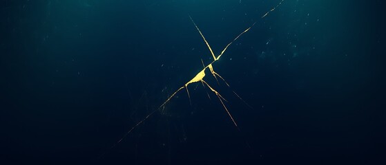Golden crack on dark blue background.