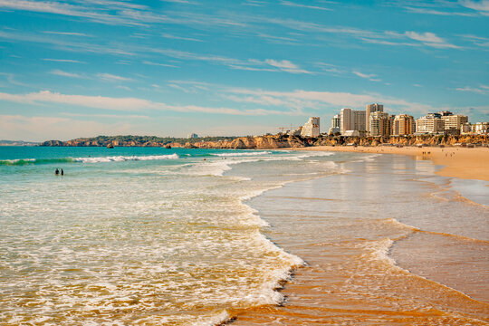  Stunning coastal views of Praia da Rocha with its golden sands and modern skyline.