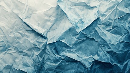 Obraz premium Abstract light and dark blue crumpled paper texture background