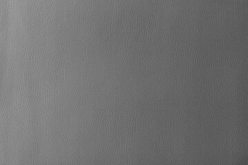 Texture of genuine leather, artificial leatherette grey background