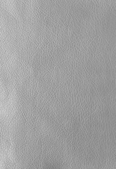 Texture of genuine leather, artificial leatherette grey background