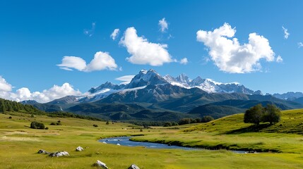 Fototapeta premium Majestic snow-capped mountains, valley river, green meadow, sunny sky. Perfect for travel brochures