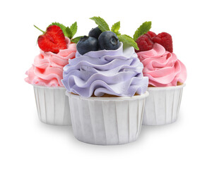 Delicious cupcakes with berries isolated on white