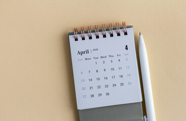 Desktop calendar for April 2025. A desktop calendar for planning and organizing for each day.