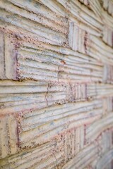 Vintage Textured Concrete Wall Pattern with Modernist Relief Design. Mid-Century Architectural Surface Detail with Geometric Cross Motif and Weathered Aesthetic