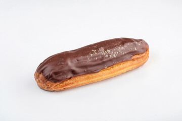 Chocolate Eclair adorned with a Glossy Topping that catches the eye and entices taste buds