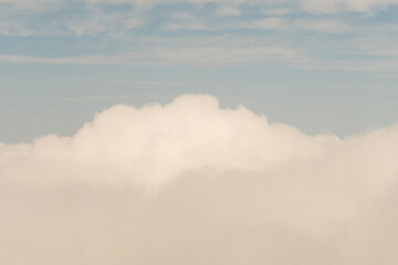 Aerial photograph of clouds outside of my airplane window on a cross country plane trip from Richmond Virginia to New York City