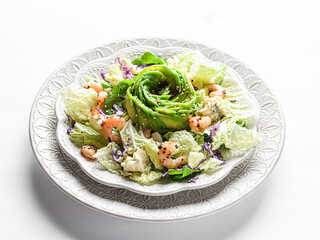 salad with shrimp, cheese and avocado in the form of a rose