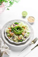 salad with shrimp, cheese and avocado in the form of a rose