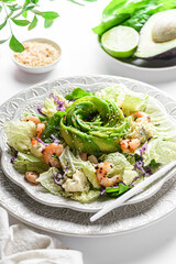 salad with shrimp, cheese and avocado in the form of a rose