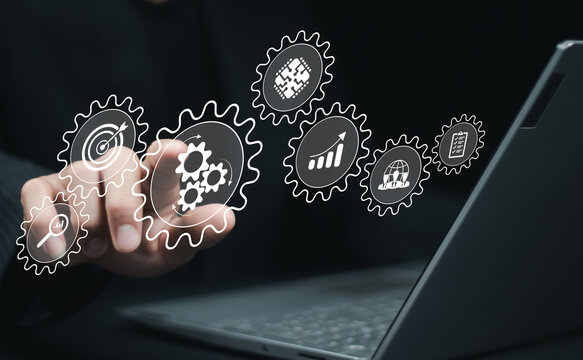 Person working on computer laptop. automation, industrial business process workflow optimisation concept on virtual digital screen. Automation Software Technology Process System Business concept.