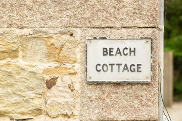 House name sign on wall in Durgan village, Cornwall, England