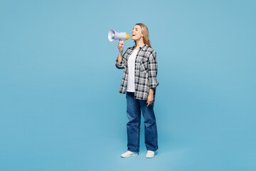 Full body young woman wears checkered grey shirt casual clothes hold in hand megaphone scream...