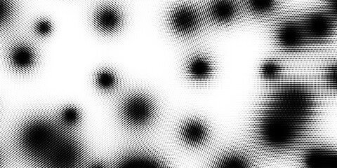 Black and white halftone background. Abstract illustration of round particles. The dots form shapeless images. Vector graphics.