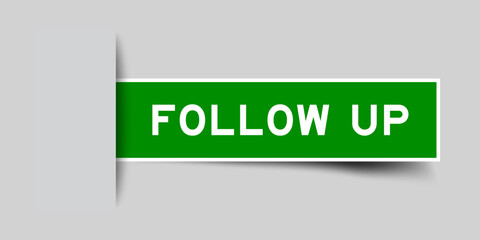 Green color square shape sticker label with word follow up inserted in gray background