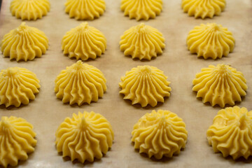 The Making of mini vanilla eclairs.Dessert, profiteroles. Food concept