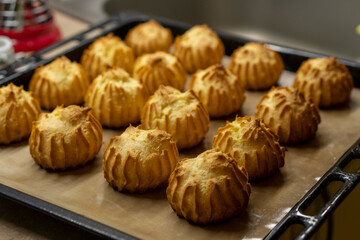 The Making of mini vanilla eclairs.Dessert, profiteroles. Food concept