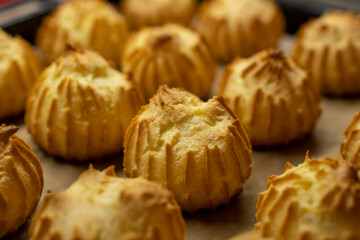 The Making of mini vanilla eclairs.Dessert, profiteroles. Food concept